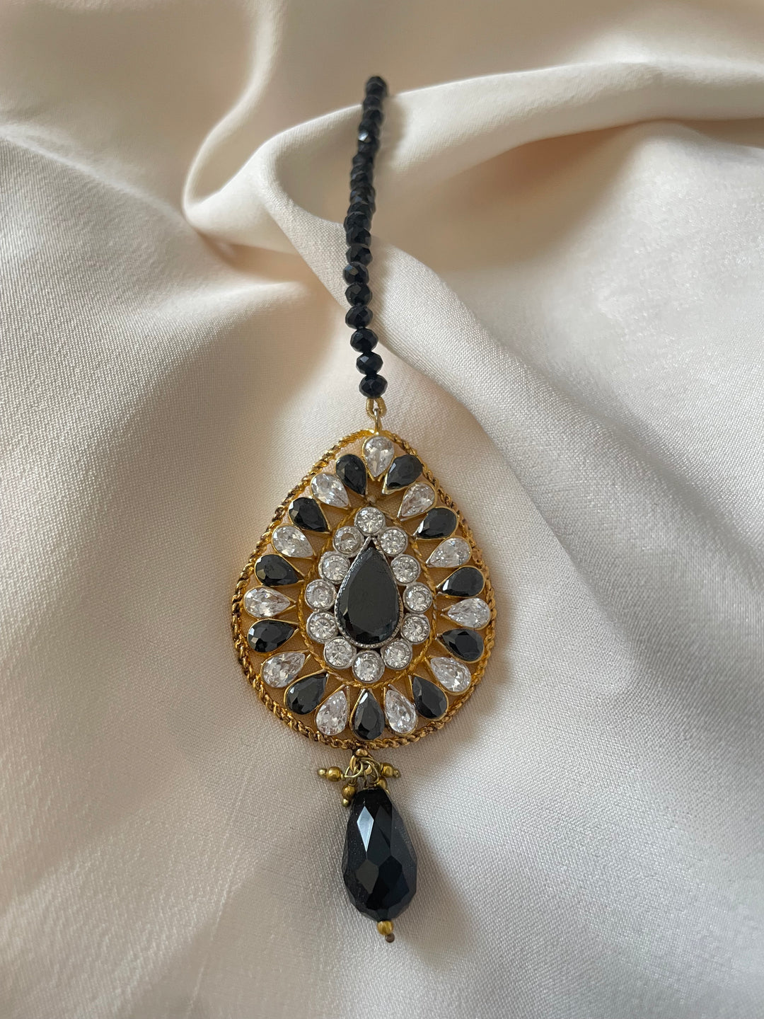 Black & gold tikka